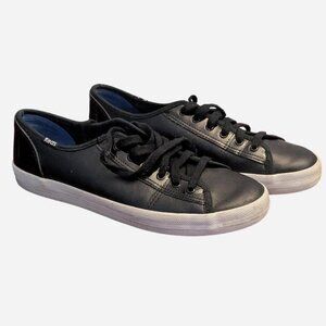 Black Keds trainers with blue accents